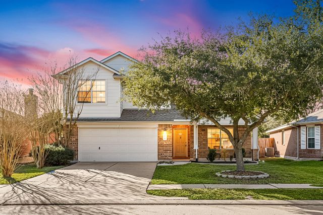 A starter home in north Houston at twilight