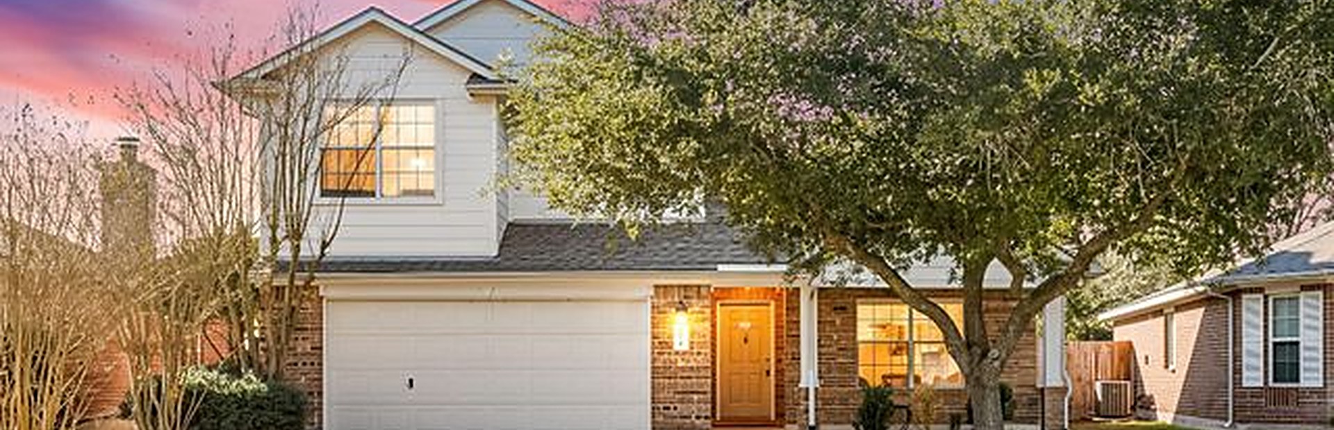 A starter home in north Houston at twilight